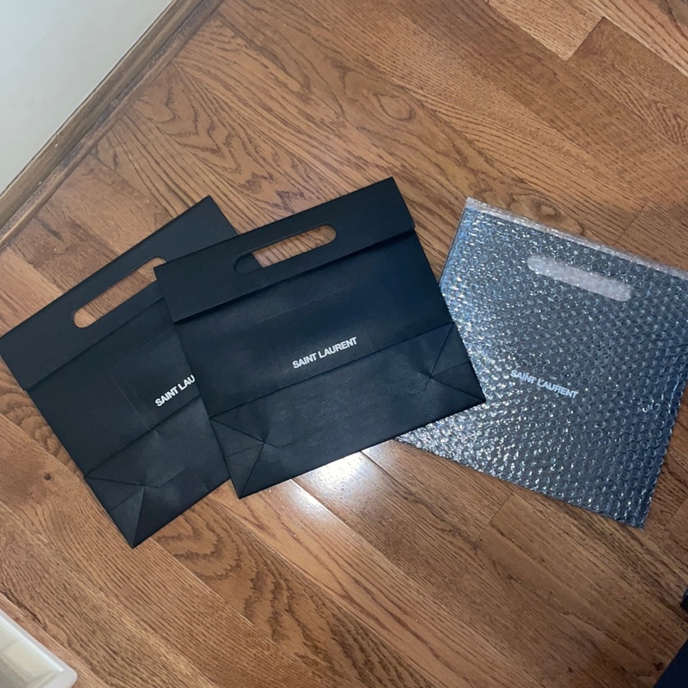 Authentic YSL paper clutch bags